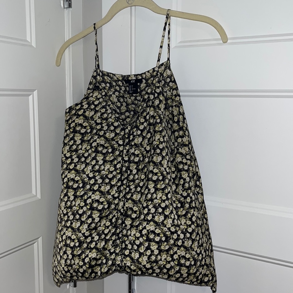 Black, white and green flowered tank top with deep v in size 2